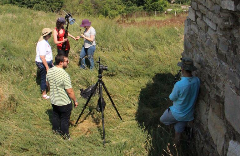 Students participating in Reflectance Transformation Imaging data collection at Stobi.