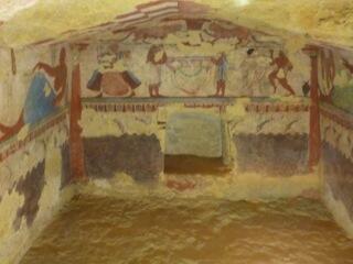 Photograph of a mural on the interior walls of a room at the Caere dig site.