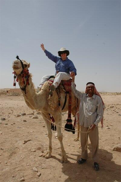 Dr. Reeves on camel back in Jordan.