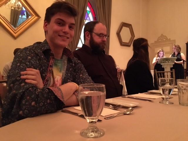 A student and a professor waiting for dinner