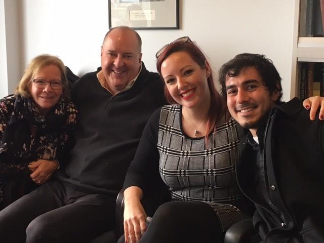 A graduate with their family