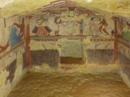 Photograph of a mural on the interior walls of a room at the Caere dig site.