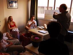 Students attending a class on how to clean bones during Humayma excavation field study.