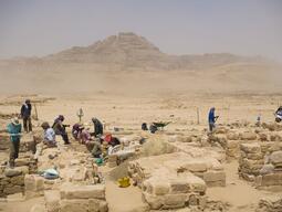 Photograph of students and locals working at Humayma excavation site.