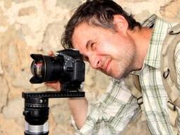 Photograph of Dr. Bevan taking a photo of the Stobi excavation site.