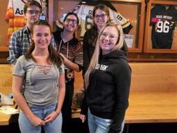 Photograph of 5 students.