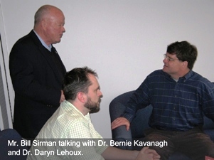 Three people having a conversation