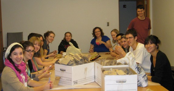 A group of students seated at a large table