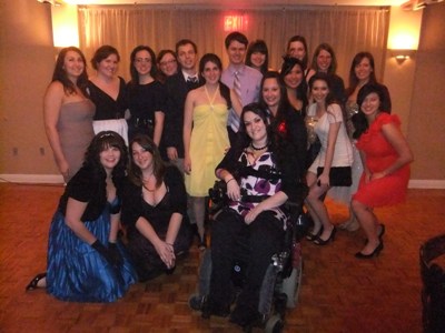  A group of graduates smiling for a photo