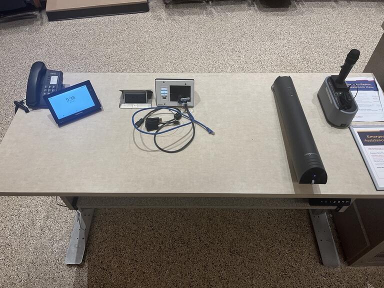 The podium is height adjustable and comes equipped with lecture capture, a document camera and a set of microphones.