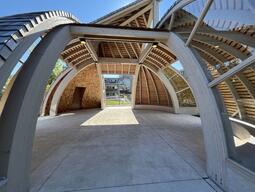 View of the Outdoor Indigenous Gathering Space from the West side.