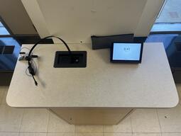 Top-down view of the podium. The podium is not movable or height adjustable. The podium is accessible.