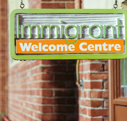 Immigrant Welcome Centre Sign -  visit Cluster Page