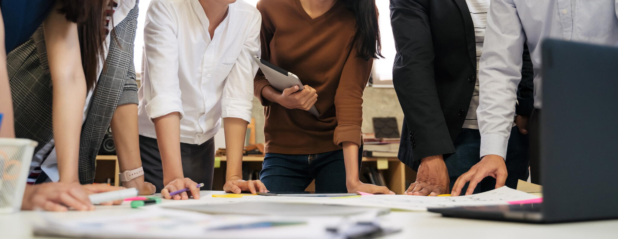 people working around a table