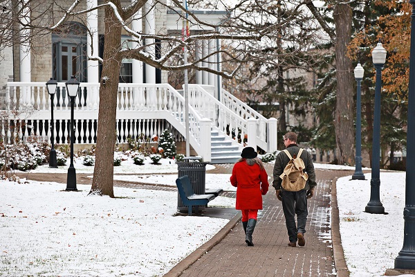 people walking towards Summerhill in winter
