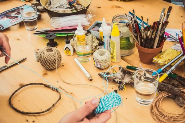 Craft supplies on a wood table