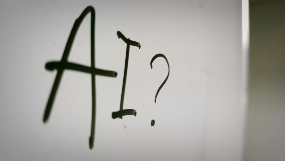 AI? written on a whiteboard