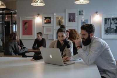 students working on a laptop