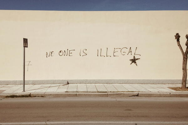 Graffiti on a beige wall