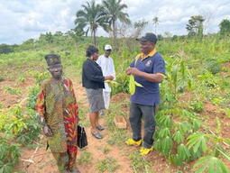 PhD student Olusola Akintola assessing co-op farms during research trip