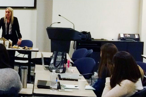 Macey Nielissen speaking to class