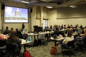 Dezi Singh speaking to graduate classes