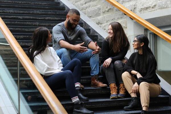 Students sitting on stairs