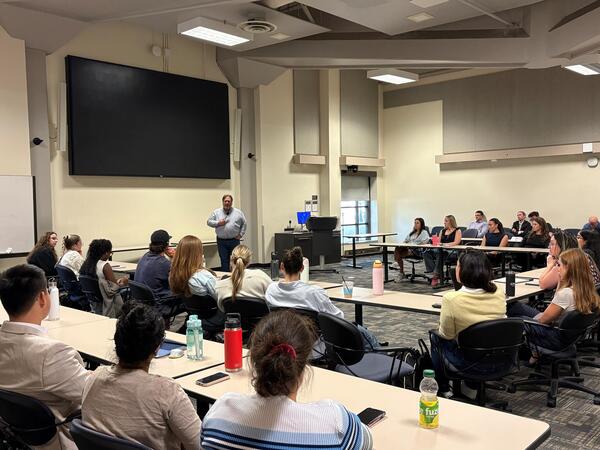 Dave Bulmer speaking to  graduate students 