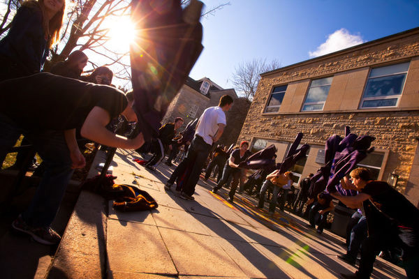 [Queen's jackets being slammed to the ground]