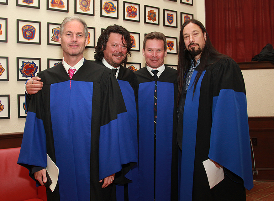 [On May 19, 2016, members of the Tragically Hip were in Grant Hall to receive honorary degrees from Queen's.]