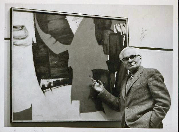 [photo of Andre Bieler with a painting]