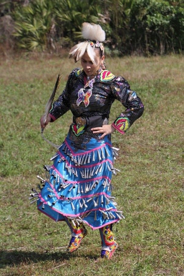 Indigenous woman dancing