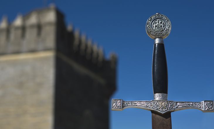 Sword in front of a castle