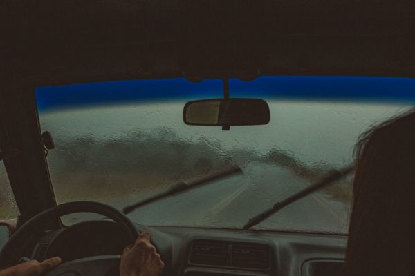 Car driving in the rain