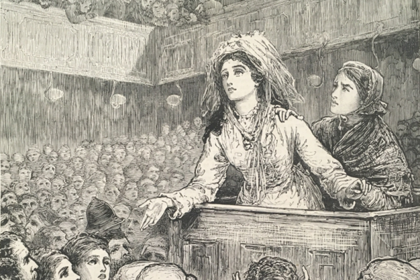 Woman pleading at a podium