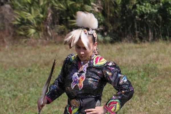 Indigenous woman dancing