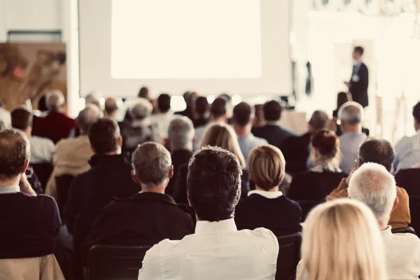 people watching a presentation