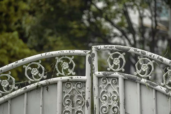 Old iron fence with paint chips