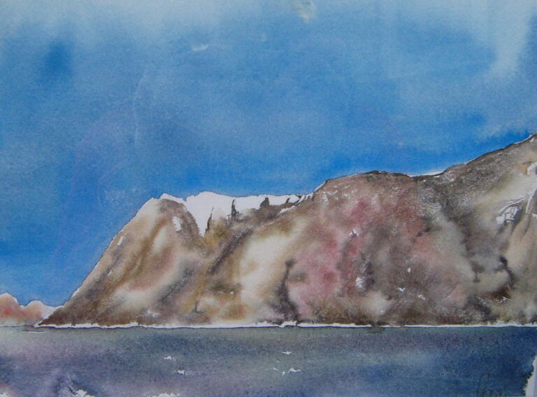 watercolour of iceberg with blue sky behind it