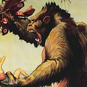 King Kong holding a smashed plane and a women