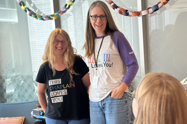 Chaplain Erin and Chaplain Heidi laughing together in the FSL Office