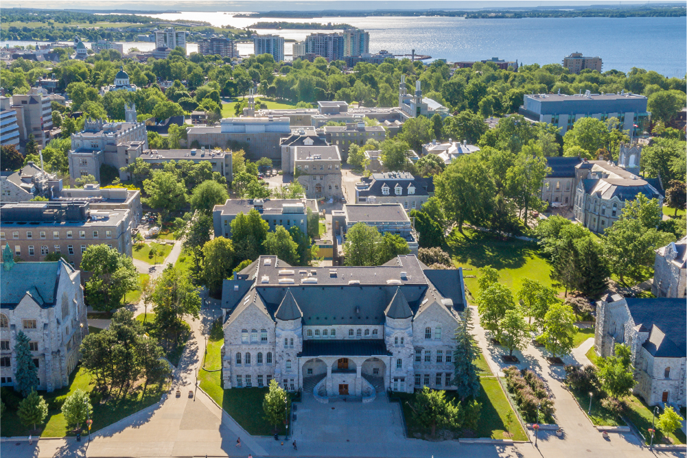 Aerial view of Queen's campus and Kingston beyond.