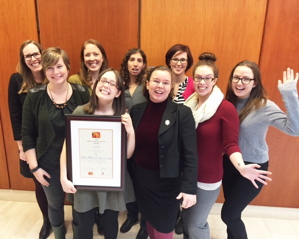 Members of the Queen's Women's Network accepting an equity award