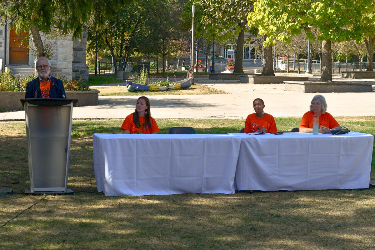 Speakers at the sacred fire