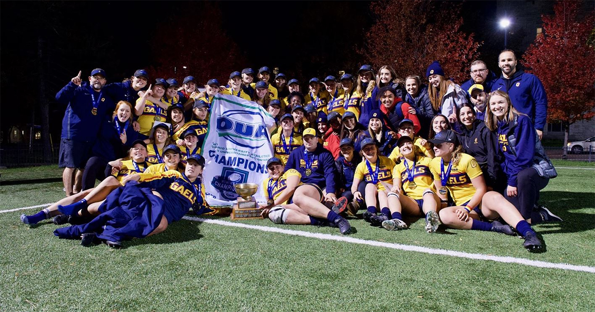 [Queen's women's rugby team celebrates OUA title]