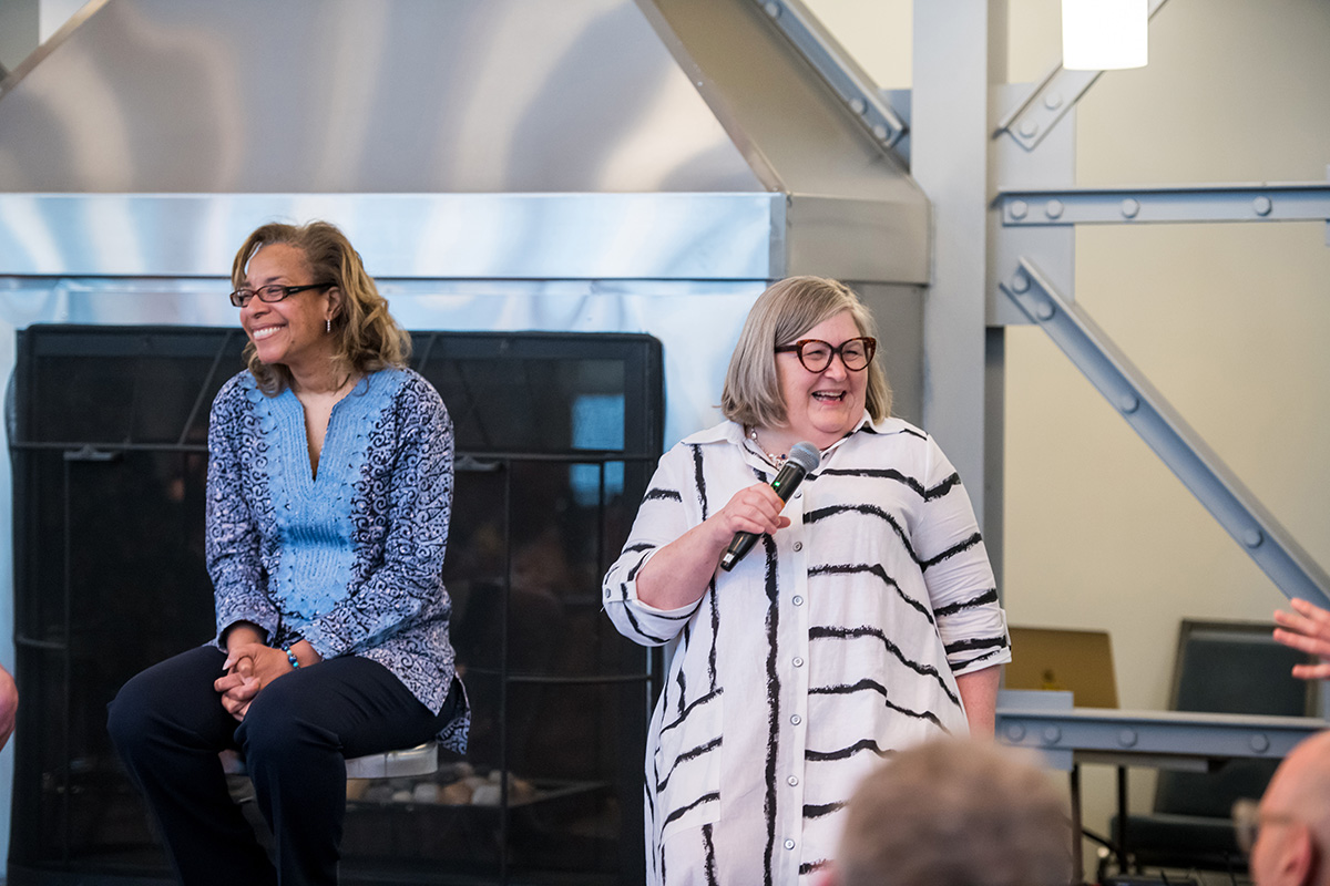 Wanda Costen and Rebecca Luce-Kapler share a laugh.