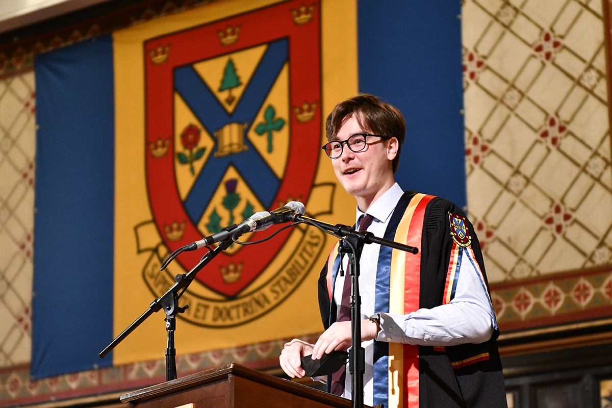 Rector Owen Crawford-Lem speaks from the podium during the convocation ceremony on Friday, May 27.
