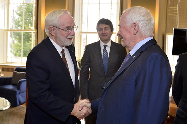 Professor Emeritus and Nobel Laureate Arthur McDonald is greeted by Governor General David Johnston as he visits Rideau Hall. Looking on is Vice-Principal (University Relations) Michael Fraser. (Office of the Secretary of the Governor General)