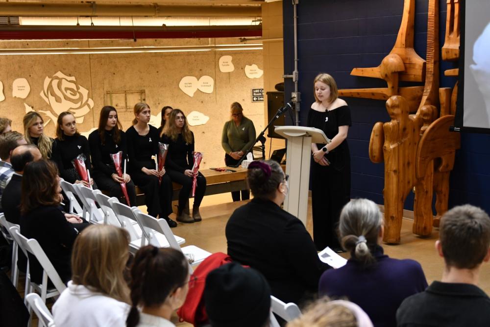 Queen's community members gather for an in-person ceremony marking National Day of Remembrance and Action on Violence Against Women.