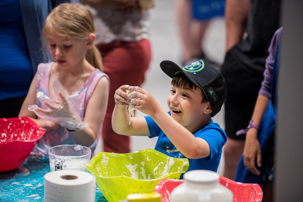 Photograph of children engaging in activities at Science Rendezvous.